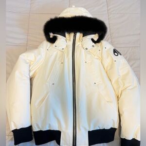 White Moose Knuckle Puffer Jacket with Black Fur Trim